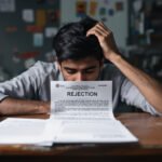 How to clear SSC Exam: Student looking at SSC exam rejection letter sitting at desk